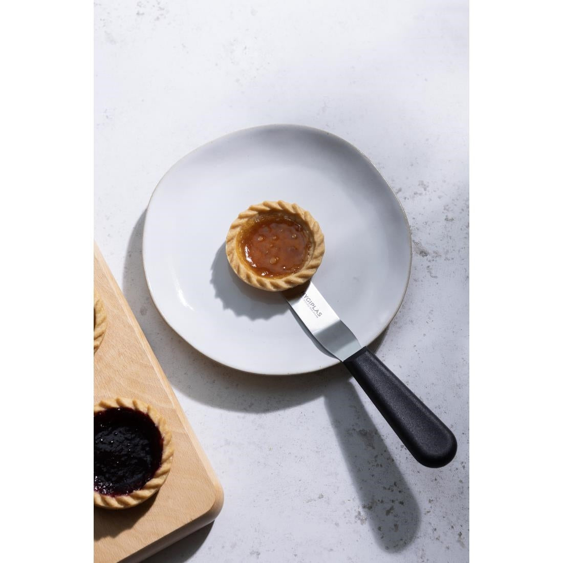Couteau spatule coudé Hygiplas noir 100mm — D420