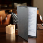 Protège-menus en PVC Olympia A5 noir — E219
